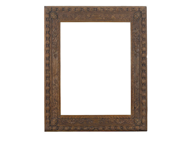 A French 17th Century carved oak frame
