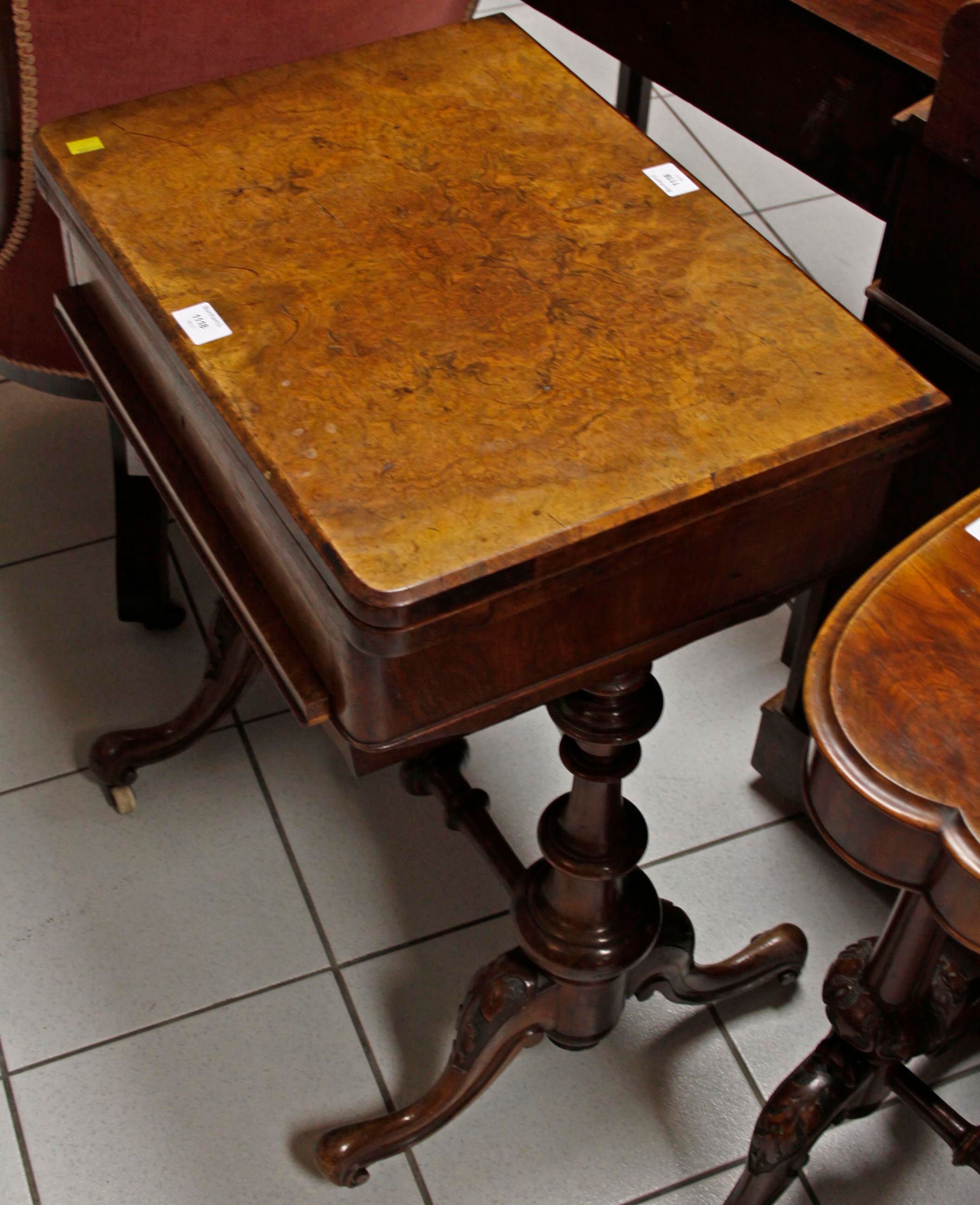 A Victorian walnut work table,