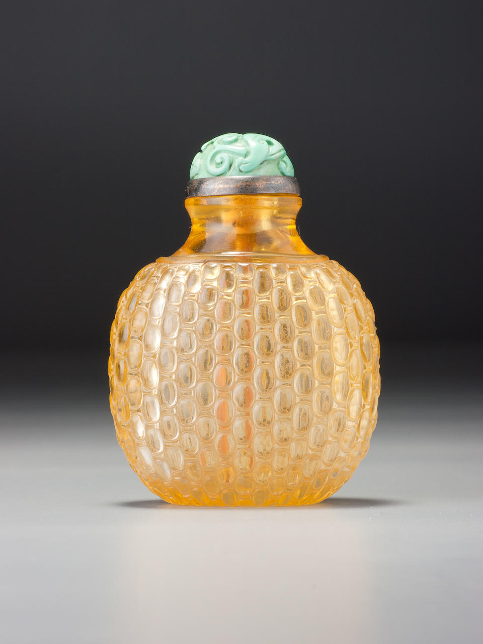A golden-yellow glass 'basket-weave' snuff bottle 1750-1840.
