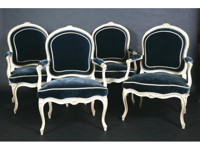 A set of four French 18th century Louis XV cream-painted fauteuils &#224; la Reine By Antoine Nicolas Delaporte, Paris,