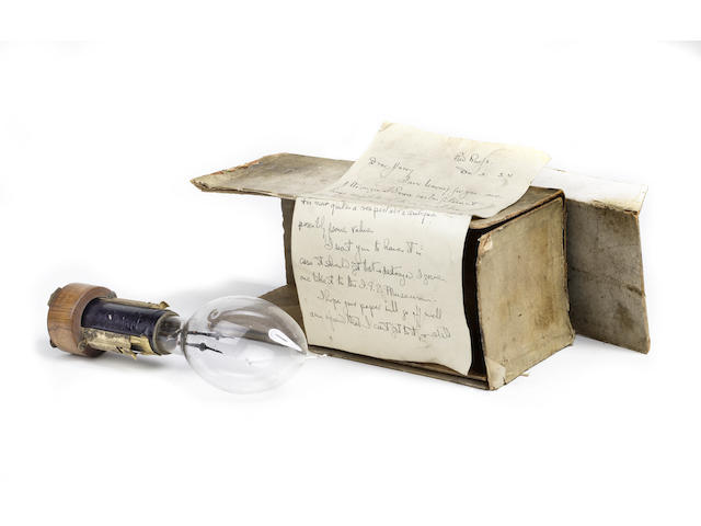 Sir Joseph Swan - an early patent model electric light bulb, with socket assembly, circa 1881, with carton,
