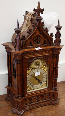 A 19th Century Gothic style oak mantel clock,