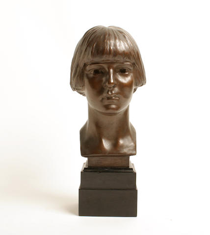 A 20th century bronze bust of a young girl