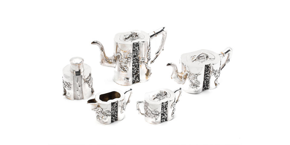 A Chinese export silver four-piece tea and coffee service and associated tea caddy, tea service stamped "Hunggnong & Co", and with Chinese character marks, tea caddy by Luen Wo and with Chinese character mark,  (5)