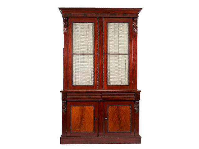 A Victorian mahogany and glazed bookcase cabinet