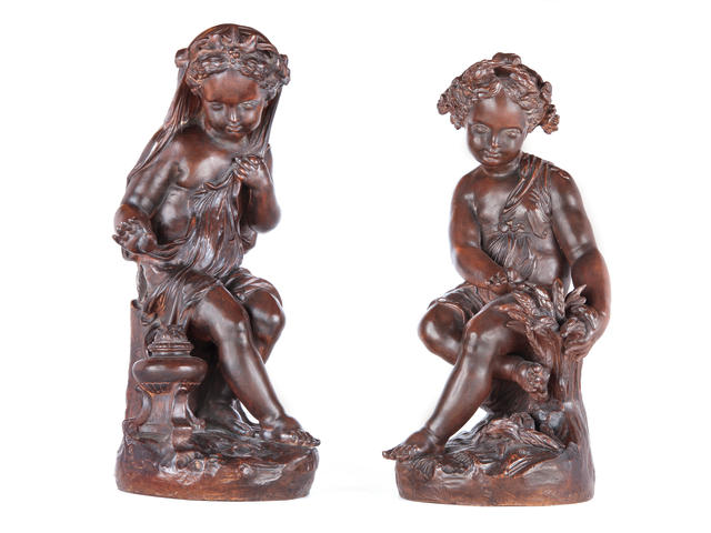 A pair of French terracotta figures emblematic of winter and spring, after Clodion