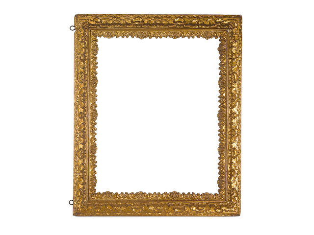 A Spanish 17th Century carved and gilded frame