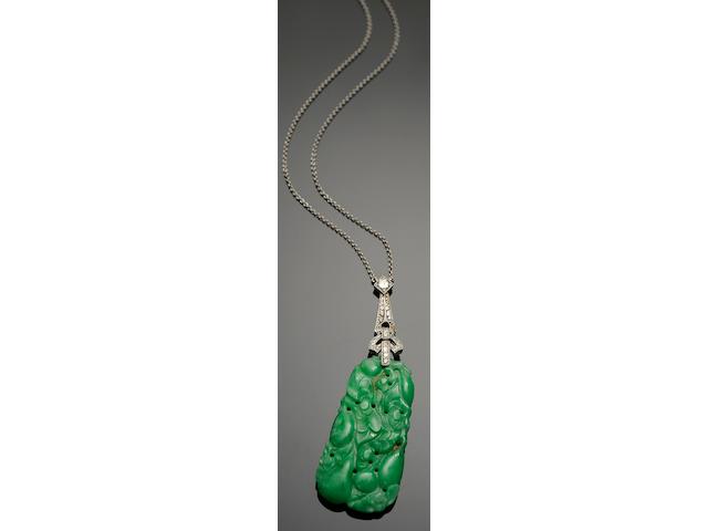 A jade and diamond pendant