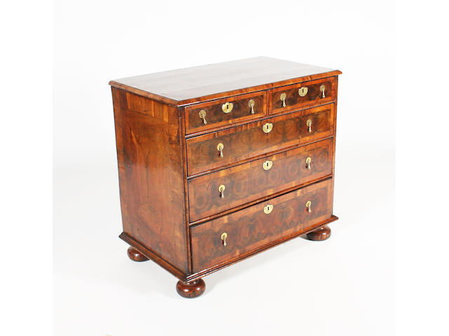 A late 17th/early 18th century oyster olivewood, crossbanded and crossgrain moulded chest