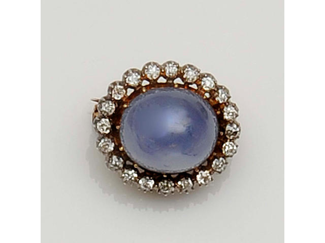 A late Victorian star sapphire and diamond cluster brooch
