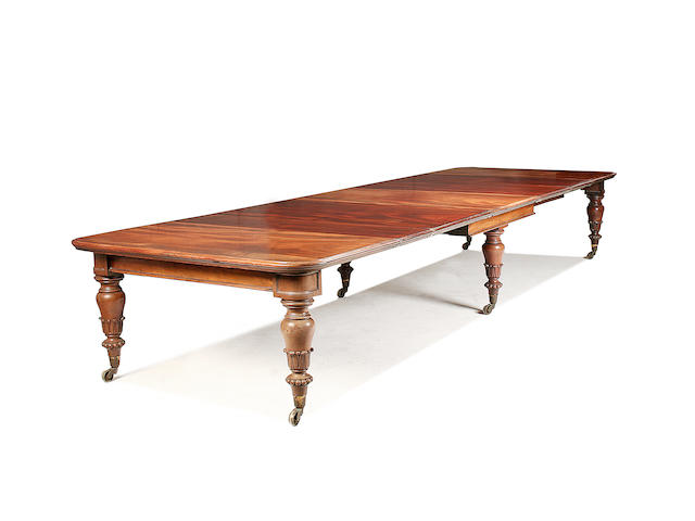 A very large William IV mahogany telescopic action extending dining table
