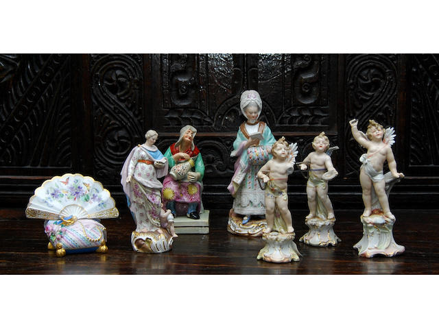 A small collection of Meissen-style figures