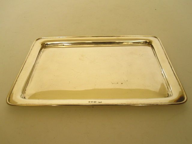 A rectangular silver tray Maker's mark KB, London 1925