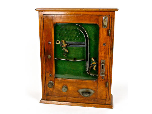A rare ball-catcher wall machine, circa 1912, most probably by Jentsch & Meerz,