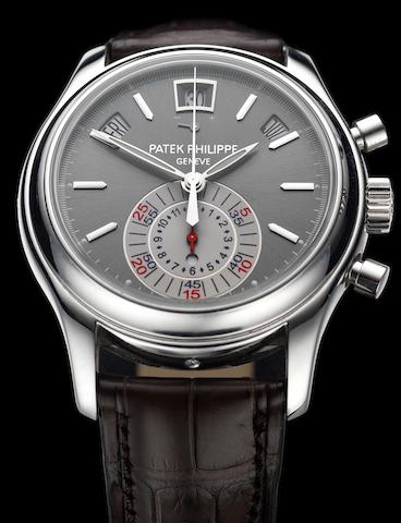 Patek Philippe. A fine and rare platinum automatic flyback chronograph annual calendar wristwatch with power reserve and day/night indication, together with fitted presentation box, Certificate of Origin and setting toolRef:5960P, Case No.4435376, Movement No.3503607, Movement No. 3503607, Sold 28th November 2008