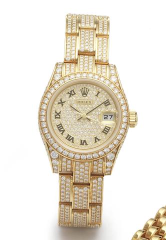Rolex. A fine 18ct gold and diamond set automatic calendar bracelet watch together with fitted leather Rolex jewellery box and papersDatejust, Ref.179458, Serial No.K566765, Sold Harrods 25th December 2002