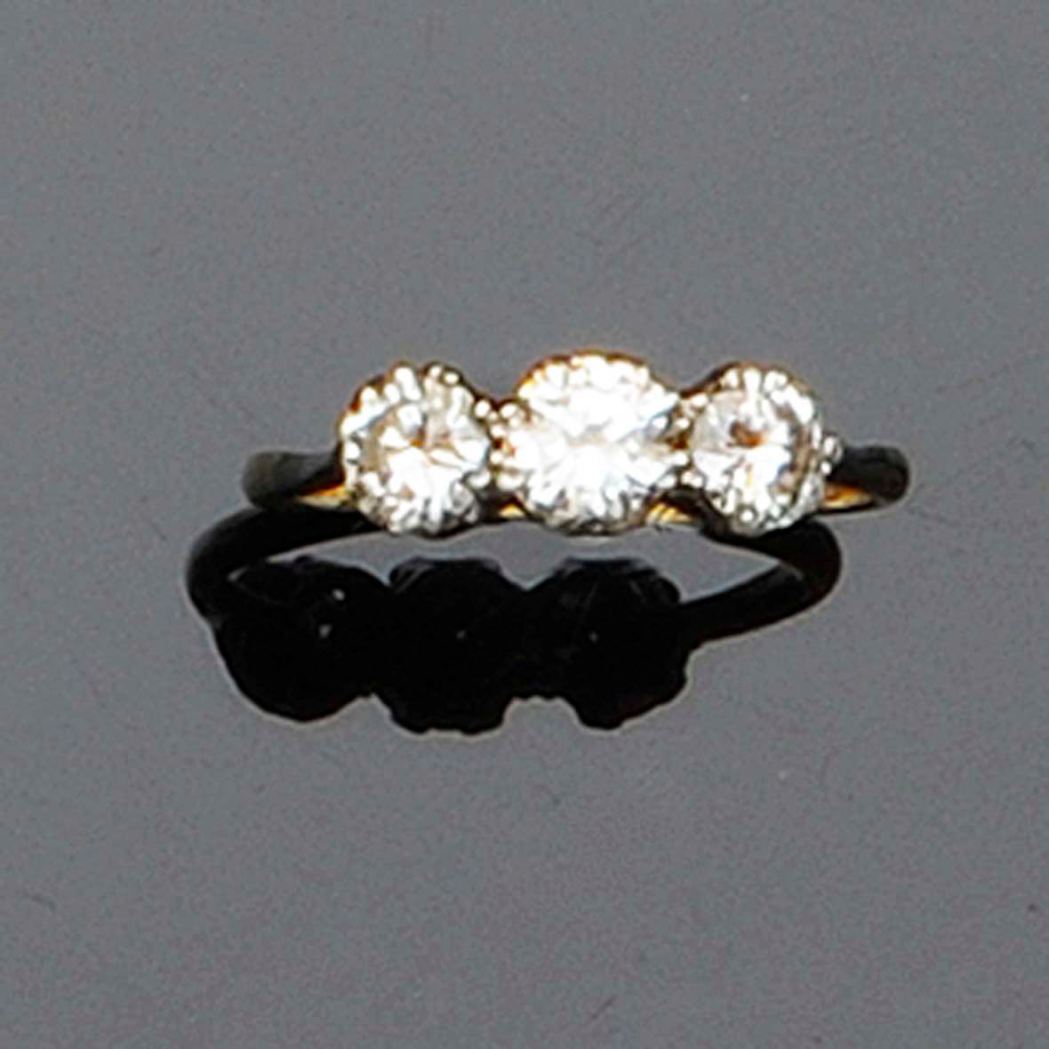 A three stone diamond ring