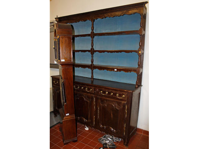 A 19th Century French chestnut farmhouse dresser and rack,with three frieze drawers and cupboards under, 200cm wide x 240cm high