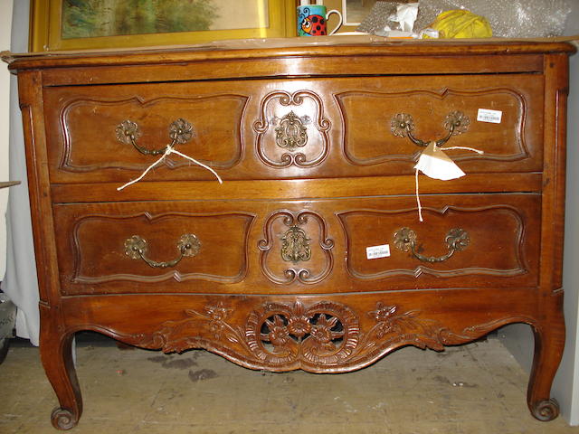 A Louis XV style serpentine commode