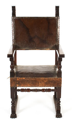 A walnut and leather open armchair, Spanish 17th century and later