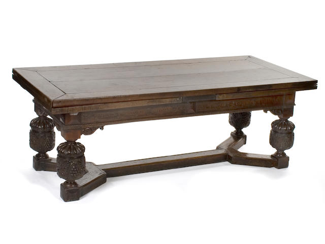 A rare early 17th century walnut and marquetry draw leaf refectory table Provenance: Earl of Derby, Knowsley Hall, Prescott, Merseyside. Purchased by the present vendor in the 1960s