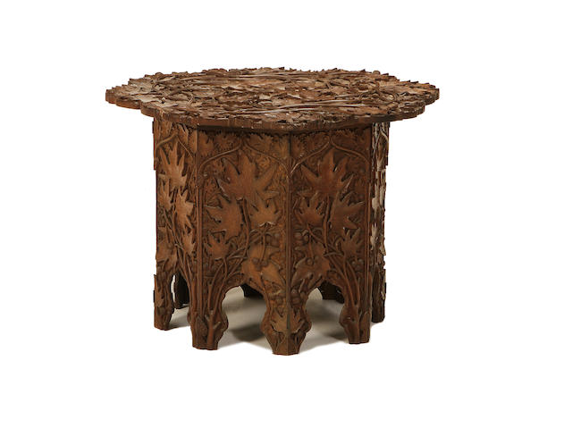 A North Indian early 20th century carved walnut centre table