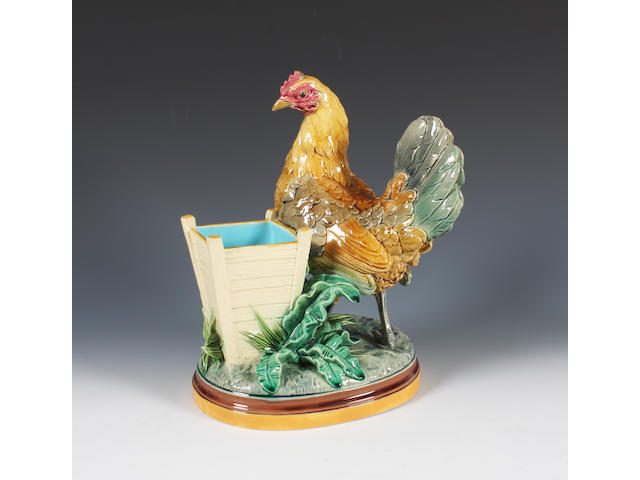 A Minton majolica spill vase modelled as a hen by John Henk Dated 1876.