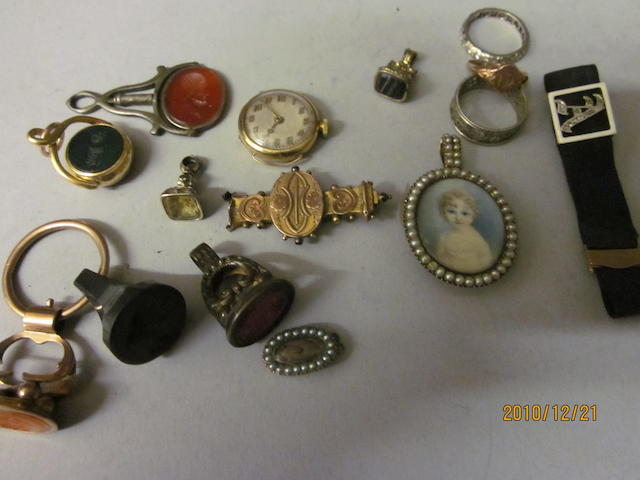 An oval miniature pendant, (Qty)
