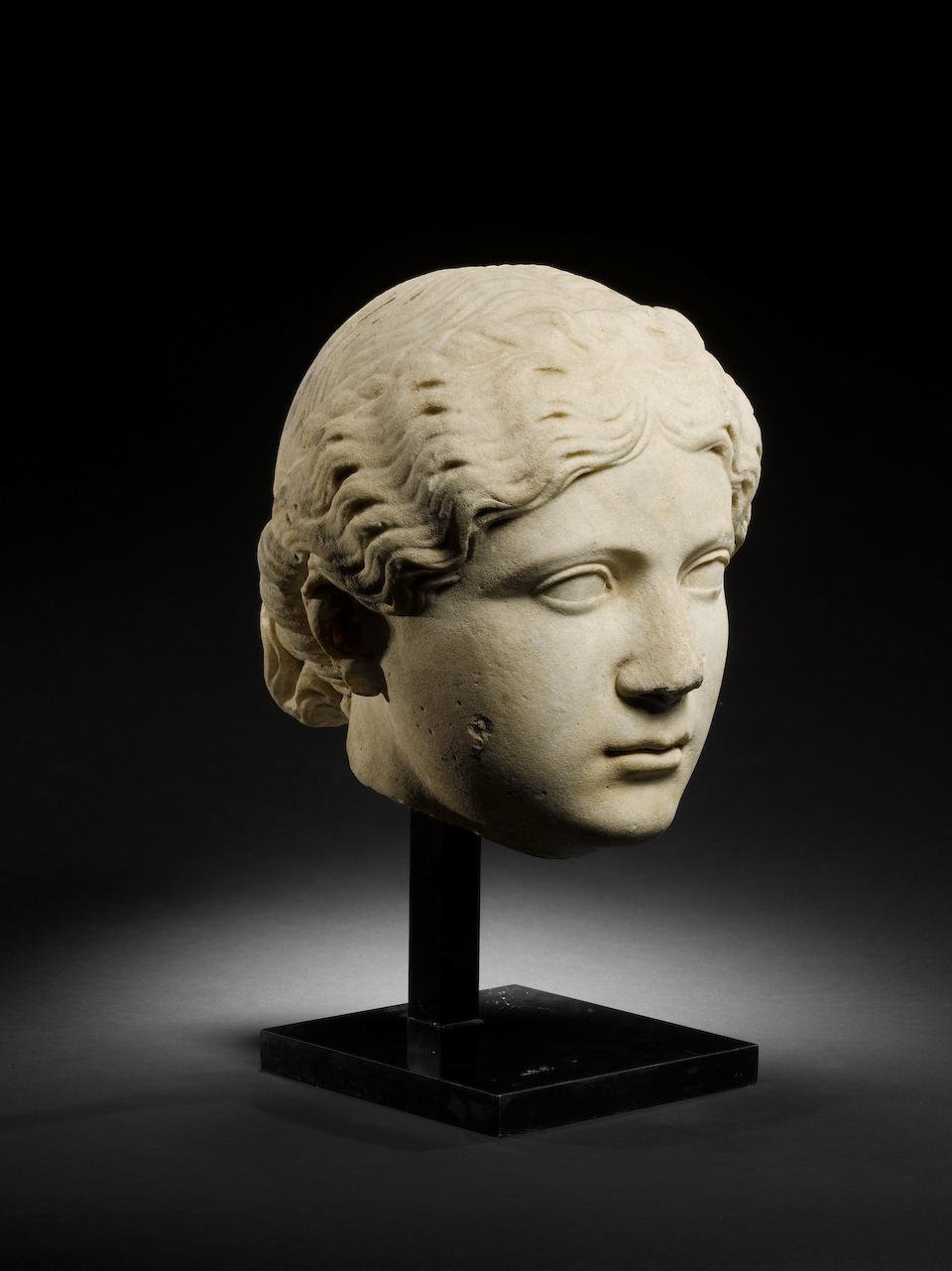 A large Roman marble female portrait head