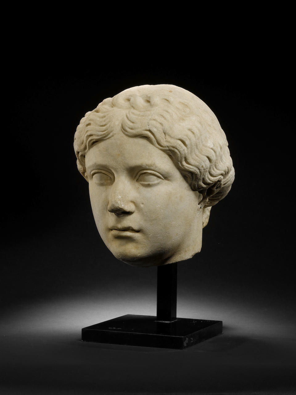 A large Roman marble female portrait head