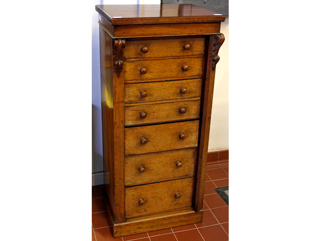 A Victorian Pollard oak secretaire Wellington chest