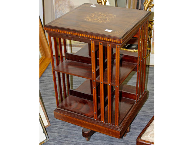 A late Victorian mahogany and boxwood strung revolving bookcase, 50 x 50cm