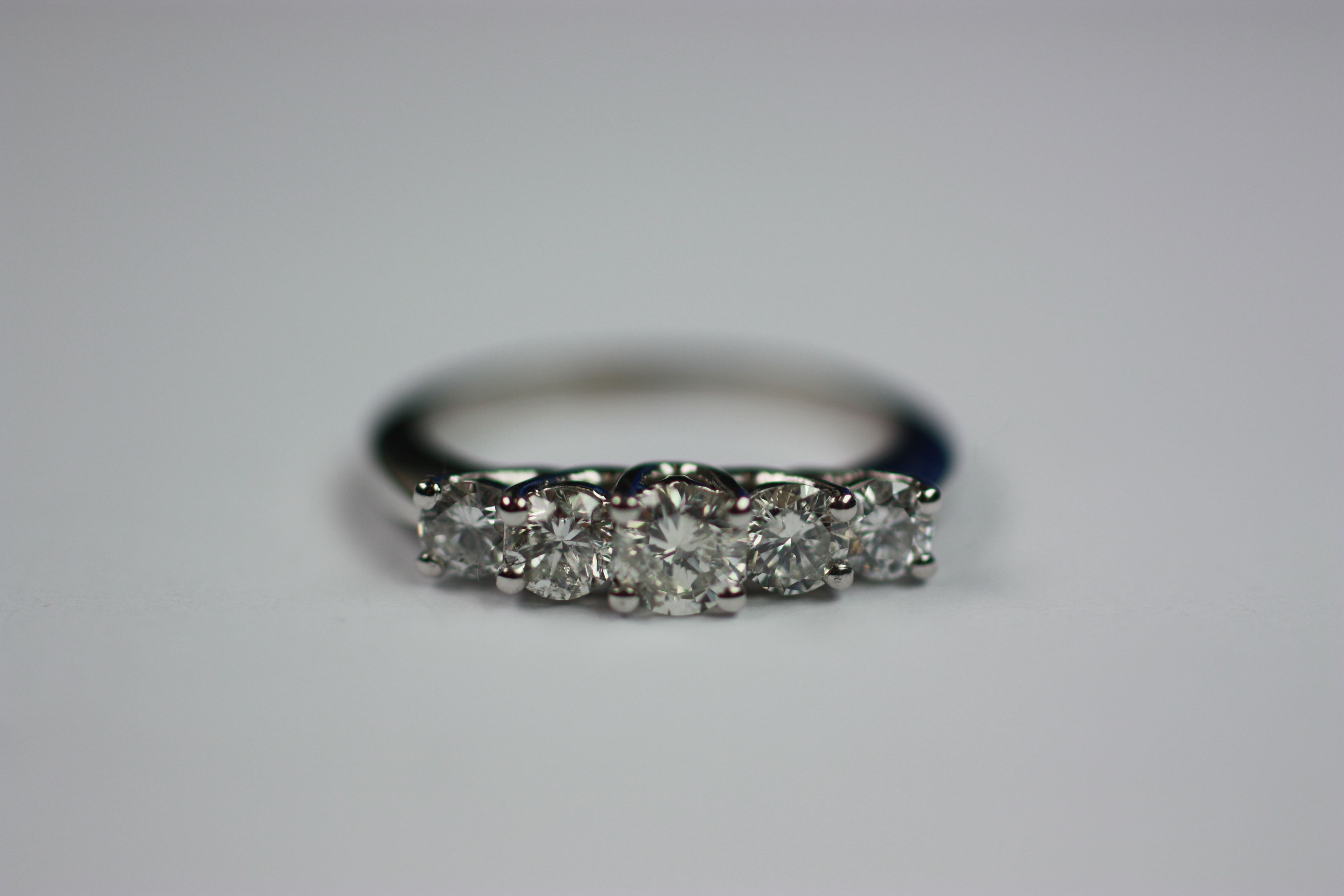 A diamond five stone ring