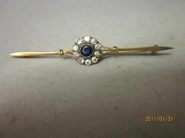 A sapphire and diamond bar brooch,