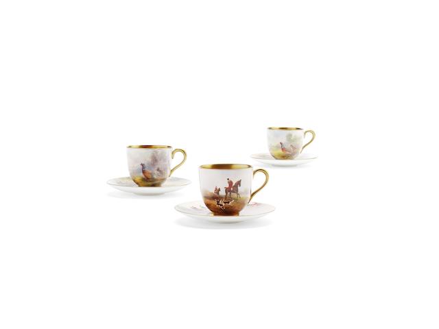 Three Royal Worcester coffee cups and saucers