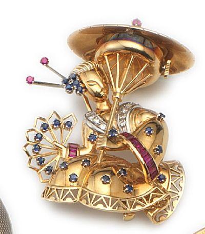 Rolex. An 18ct gold, diamond, sapphire and ruby set watch brooch in the form of a Geisha girl1950's