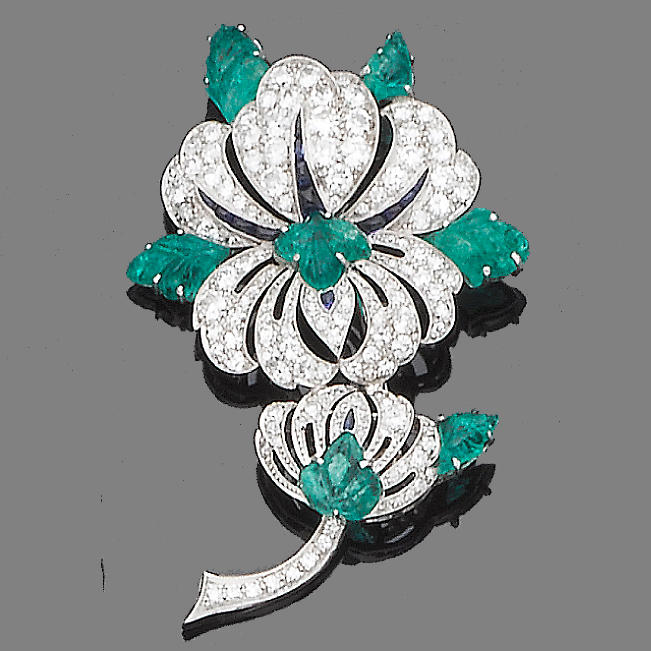 Bonhams : An emerald, sapphire and diamond flower brooch,