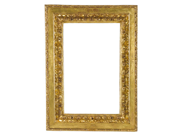 An Italian early 17th Century carved and gilded cassetta frame