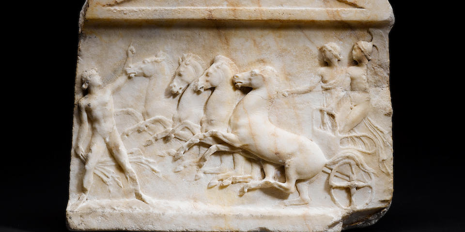 A Roman marble relief panel