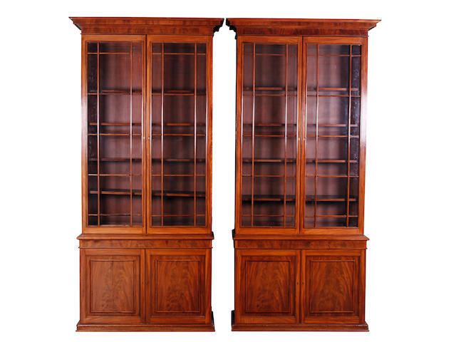 A pair of William IV mahogany library bookcase cabinets