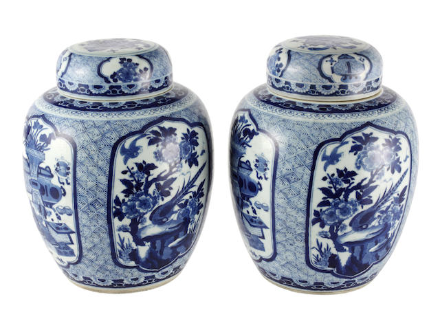 A pair of blue and white baluster jars and covers 19th century