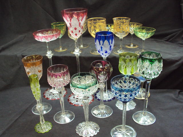 A mixed collection of coloured glassware