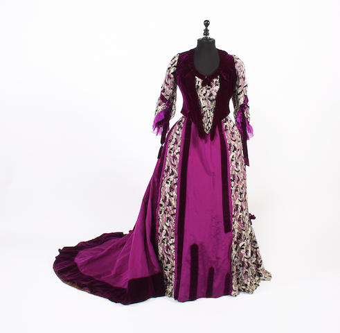 A circa 1896 dark purple and floral afternoon dress
