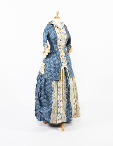 An 1870s printed cotton girls dress