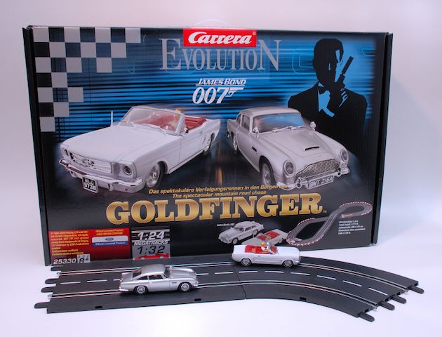 Bonhams : Carrera Evolution James Bond Goldfinger slotcar racing set unused, 007 slot car set