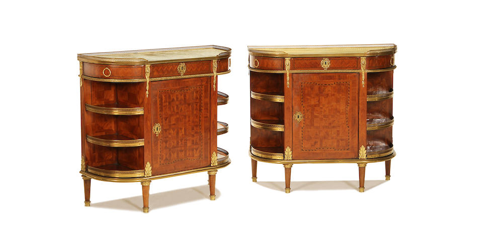 A pair of early 20th century kingwood and parquetry side cabinets in the Transitional style