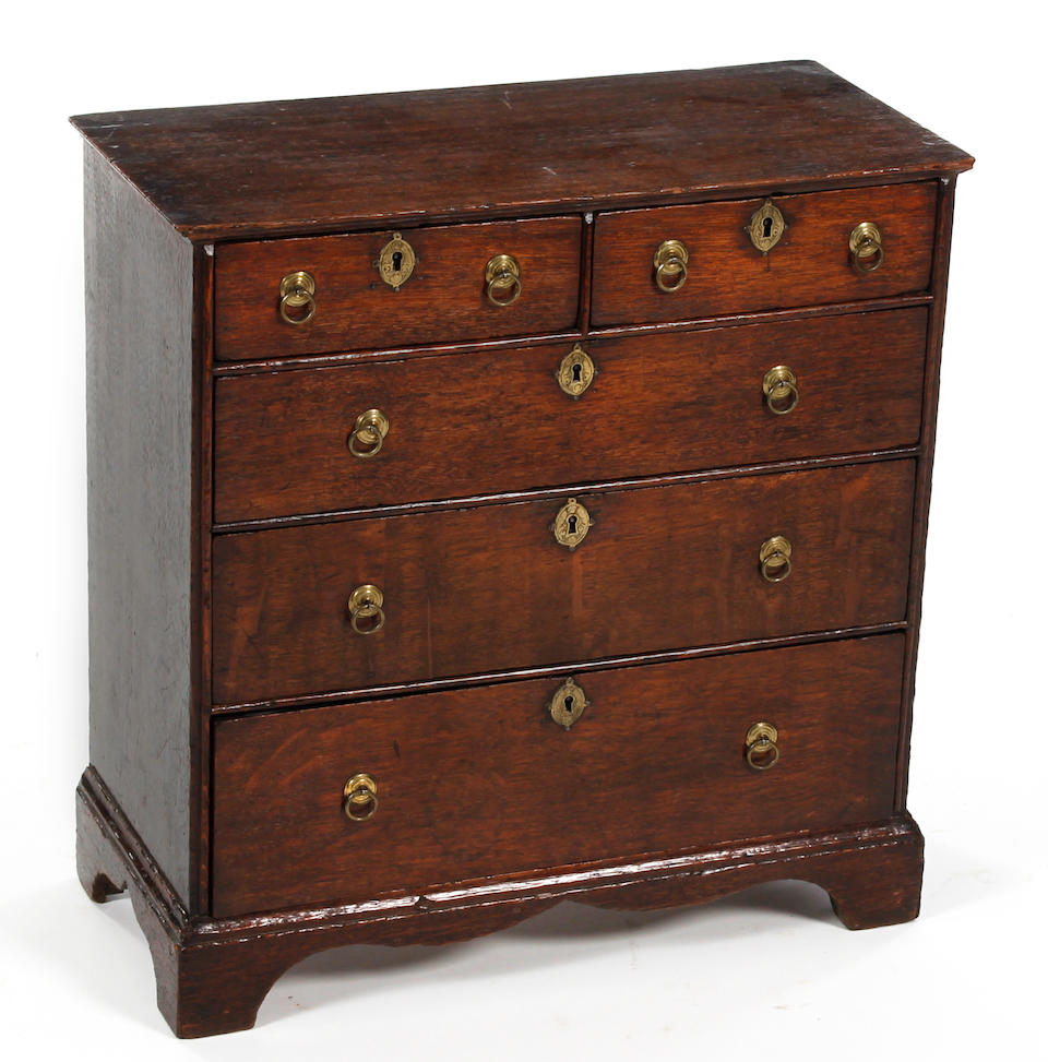 A rare George I miniature oak chest, signed and dated By Thomas Reynolds, dated 1728
