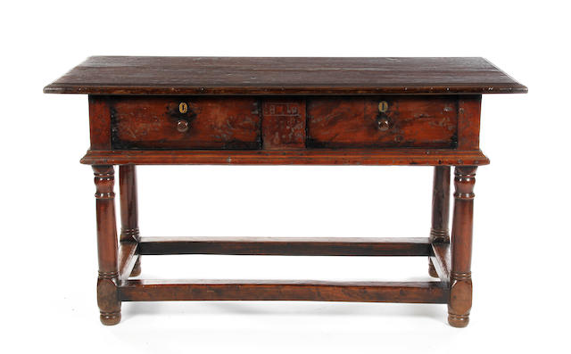 A 17th Century and later yew and oak serving-type table, North European