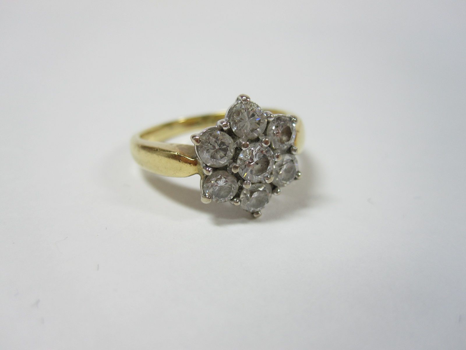 A diamond cluster ring