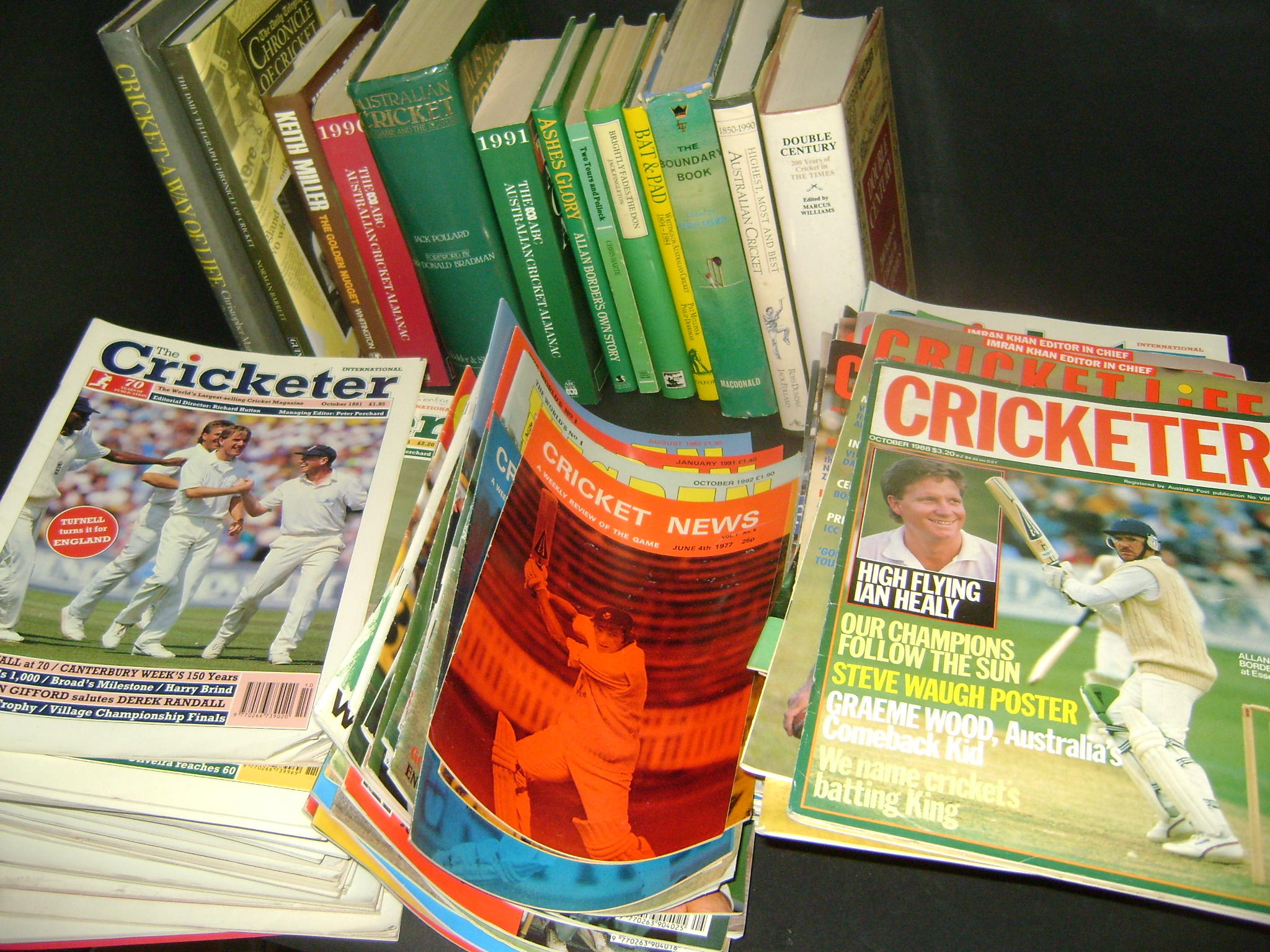 A large collection of cricket books including New Zealand and South African...